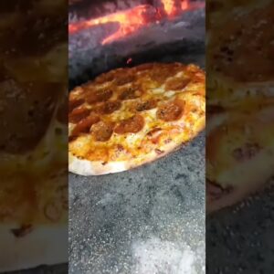 Can't beat wood fired pizza 🔥🔥    📹mcconnell_dfx4