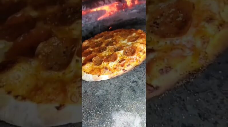 Can't beat wood fired pizza 🔥🔥    📹mcconnell_dfx4